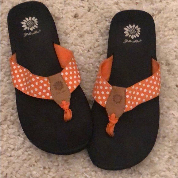 yellow box orange flip flops
